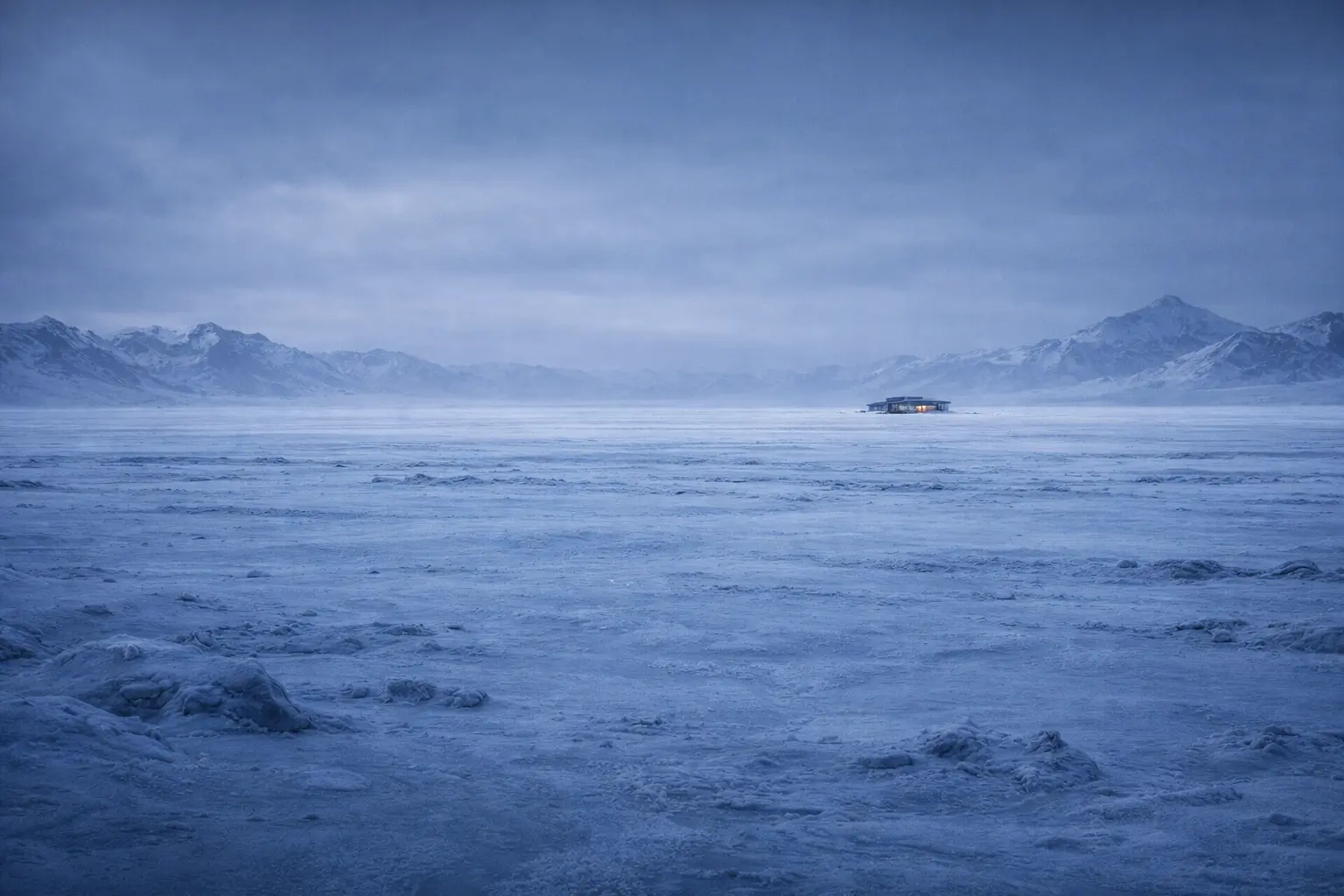 Extreme wide view of a glowing modern store far away across an endless icy plain, emphasizing isolation and scale